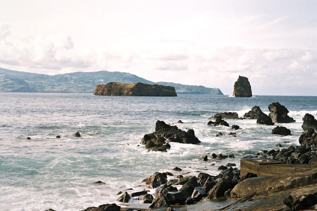 Rocks at the sea in Pico Island, Azores on film.